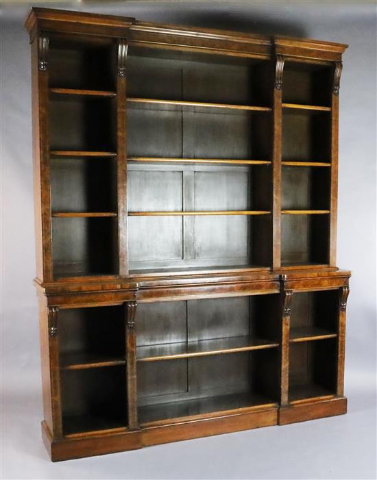 A Victorian figured walnut inverse breakfront library bookcase, W.6ft 1in. D.1ft 4in. H.7ft 6in.